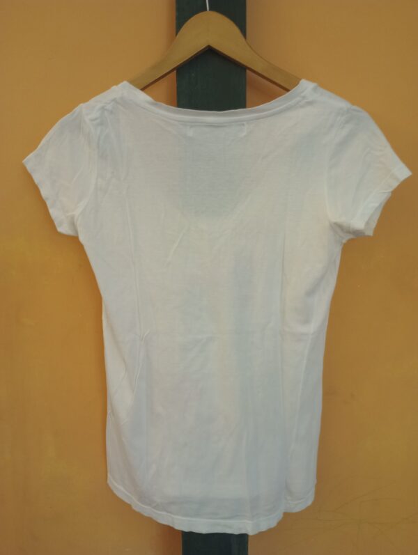 Remera zara estampada usada